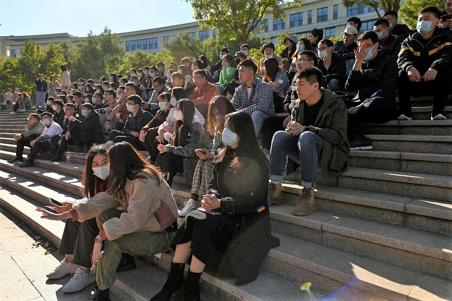 This photo taken on 17 October 2021 shows single people participating in a matchmaking event in Jinan, Shandong province, China. (Noel Celis/AFP)