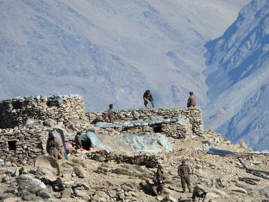 A handout photo released by the Indian Army on 16 February 2021 shows the disengagement process between the Indian Army and China's People's Liberation Army from a contested area in the western Himalayas, in Ladakh region. (Indian Army/Handout via Reuters)