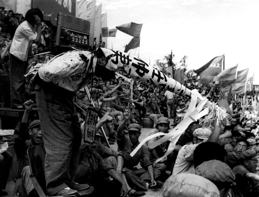 Heilongjiang party secretary Ren Zhongyi being humiliated with a prominent dunce's cap fastened on his head by Red Guards in September 1966 when the Cultural Revolution swept China. (SPH Media)