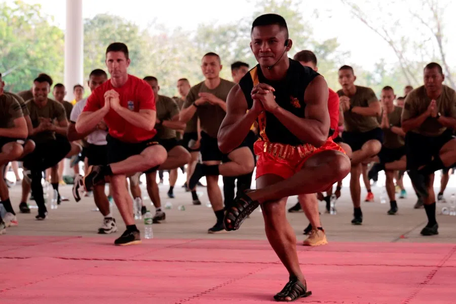 Thailand's champion Sombat Banchamek, or Buakaw, gives Muay Thai lessons to US marines as part of the "Cobra Gold 2023" (CG23) joint military exercise at the Lopburi Province, Thailand, 5 March 2023. (Napat Wesshasarta/Reuters)
