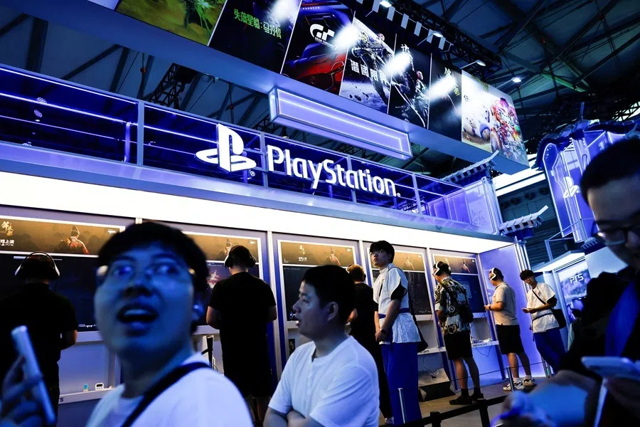Visitors walk past the PlayStation booth during ChinaJoy, in Shanghai, China, 2 August 2026.
