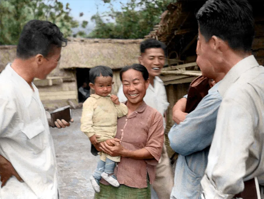 In 1953, land reforms were implemented in Taiwan, where landowners were made to divide their land among farmers and provide financial compensation. The photo shows a woman smiling on receiving land. Land reform removed the political and social foundation of spreading communism in Taiwan.