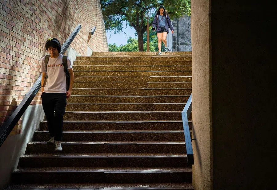 Students walk to class at the University of Texas at Austin on 22 February 2024 in Austin, Texas, US. (Brandon Bell/Getty Images/AFP)