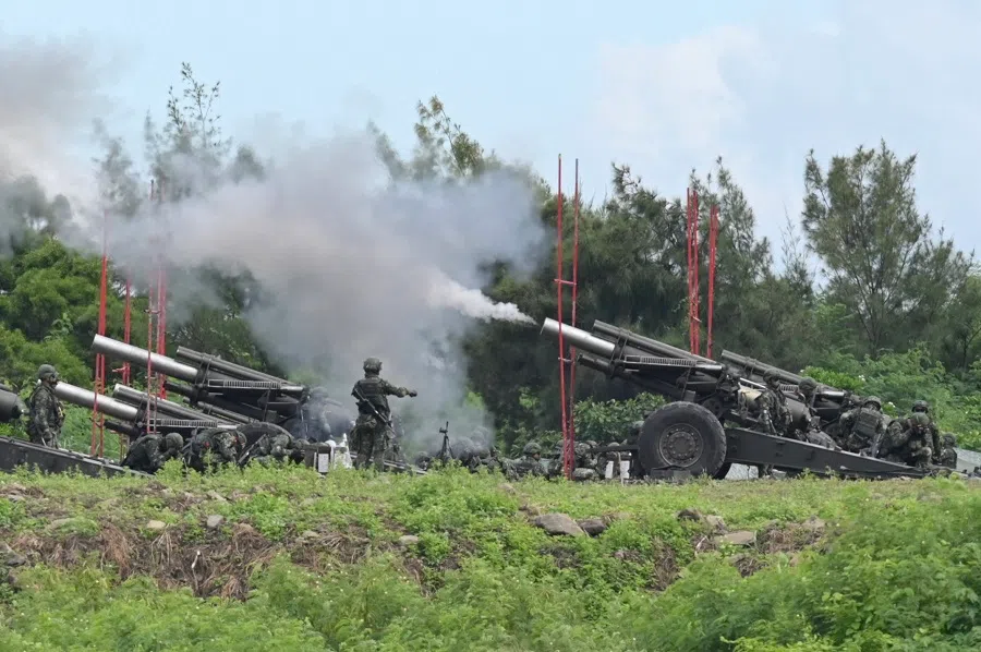Taiwan military soldiers fire 155-inch howitzers during a live fire anti-landing drill in Pingtung, Taiwan, on 9 August 2022. (Sam Yeh/AFP)