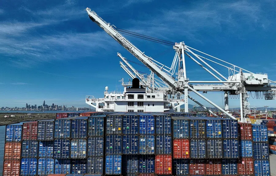 In an aerial view, shipping containers are seen on a ship that sits docked at the Port of Oakland on 2 March 2023 in Oakland, California, US. (Justin Sullivan/Getty Images/AFP)