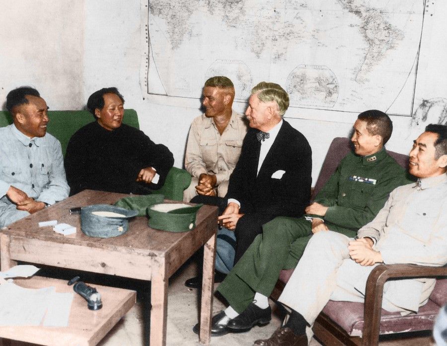 In the second half of August 1945, US ambassador to China Patrick J. Hurley went to Yan'an and met Chinese Communist Party (CCP) leader Mao Zedong (second from left). Hurley urged Mao to go to Chongqing and engage in talks with chairman of the Nationalist government Chiang Kai-shek, and guaranteed the safety of Mao and other leaders in Chongqing. As the Dixie Mission was already stationed in Yan'an in 1944, and had worked with the CCP on military intelligence and built personal ties with CCP leaders, the US-coordinated talks between the Kuomintang and CCP went smoothly. Also present were CCP army commander Zhu De (first from left), CCP representative in Yan'an Zhou Enlai (first from right), and KMT representative General Zhang Zhizhong (second from right).