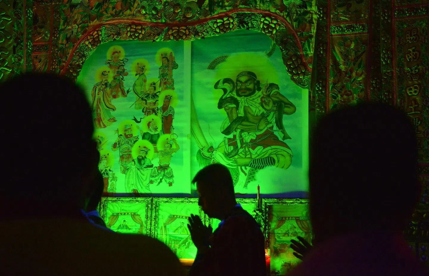 The "Passing of lantern" ritual during the Hungry Ghost Festival at Jurong Fishery Port on 18 August 2016. The ritual symbolises the passing of good will to those around as well as to the next generation. (SPH)
