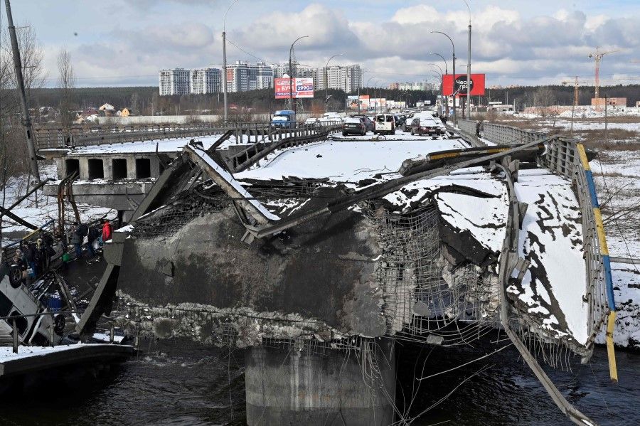 A general view of a destroyed bridge in the city of Irpin, northwest of Kyiv, Ukraine, on 8 March 2022. (Sergei Supinsky/AFP)