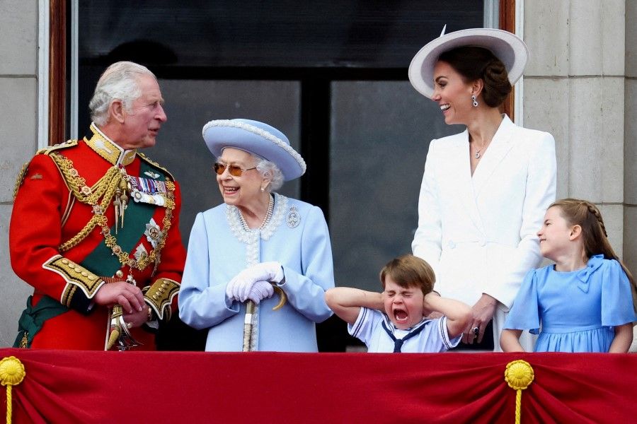The NetEase video recalled notable people who passed on in 2022, including Queen Elizabeth II (second from left). She is seen with Prince Charles (first from left) and Catherine, Duchess of Cambridge (second from right), along with Princess Charlotte and Prince Louis on the balcony of Buckingham Palace as part of Trooping the Colour parade during the Queen's Platinum Jubilee celebrations in London, Britain, 2 June 2022. (Hannah McKay/Reuters)