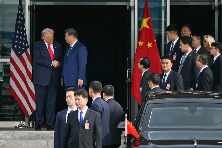 US President Donald Trump and China's President Xi Jinping shake hands as they leave after their talks at Gimhae Air Base, located next to the Gimhae International Airport in Busan on 30 October 2025. (Andrew Caballero-Reynolds/AFP)