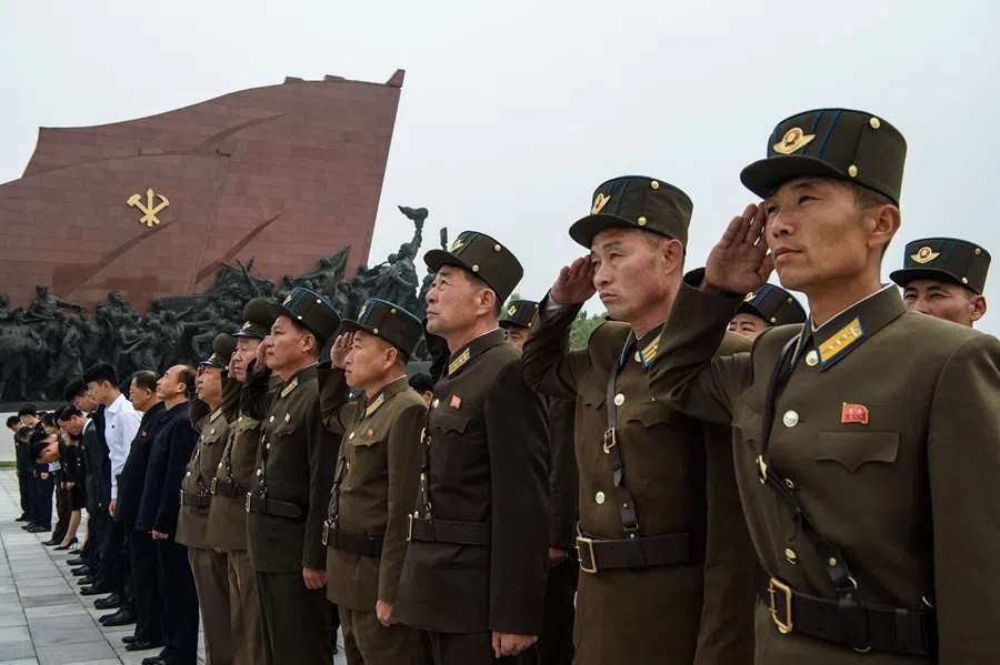 Korean People's Army service personnel salute the statues of late North Korean leaders Kim Il Sung and Kim Jong Il to pay their respects on the occasion of the 81st founding anniversary of the Workers' Party of Korea at Mansu Hill in Pyongyang on 10 October 2026.