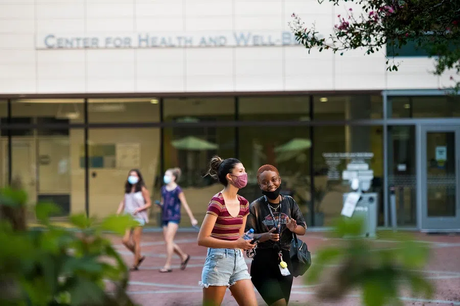 Students walk in front of the Center for Health and Well-Being at the University of South Carolina on 3 September 2020 in Columbia, South Carolina. (Sean Rayford/Getty Images/AFP)