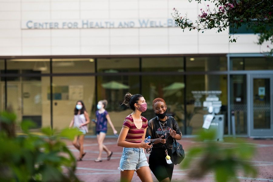Students walk in front of the Center for Health and Well-Being at the University of South Carolina on 3 September 2020 in Columbia, South Carolina. (Sean Rayford/Getty Images/AFP)