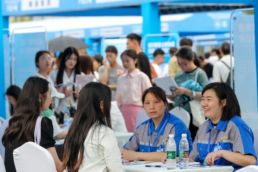 This photo taken on 14 June 2023 shows university graduates and youths attending a job fair in Yibin, in China's southwestern Sichuan province. (CNS/AFP)