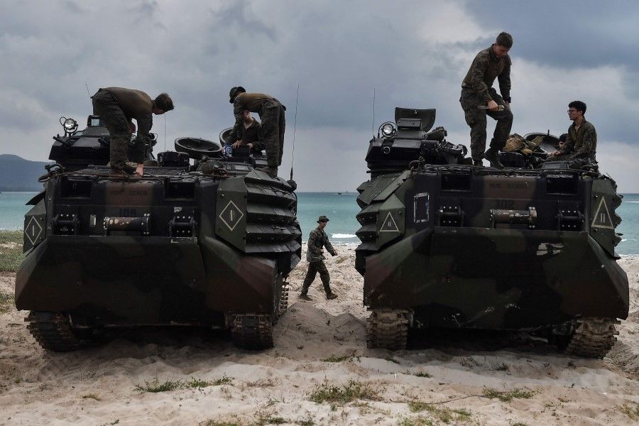 US Marines on top of amphibious assault vehicles during the joint Cobra Gold exercise in the coastal Thai province of Rayong on February 28, 2020. (Lillian Suwanrumpha/AFP)