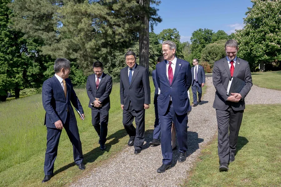 This handout photograph released by The Federal Department of Foreign Affairs or Swiss Foreign Ministry (FDFA) on 14 May 2025 shows China’s international trade representative Li Chenggang (far left), China’s Vice-Premier He Lifeng (third from left) US Treasury Secretary Scott Bessent (second from right) and US trade representative Jamieson Greer (far right) walking during a meeting to discuss trade relations and tariffs, in Geneva on 10 May 2025. (Martial Trezzini/AFP)