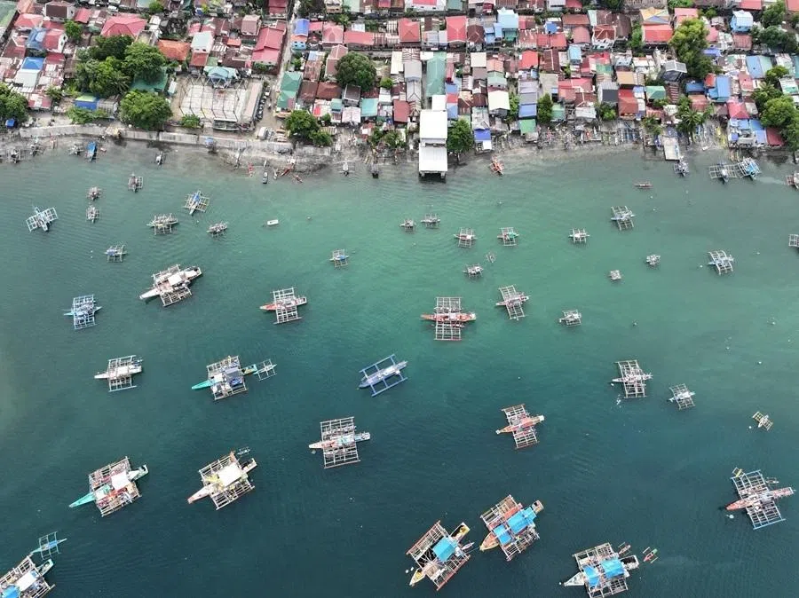 A drone view shows fishing vessels docked in Subic Bay, Zambales province, Philippines, on 9 July 2026.