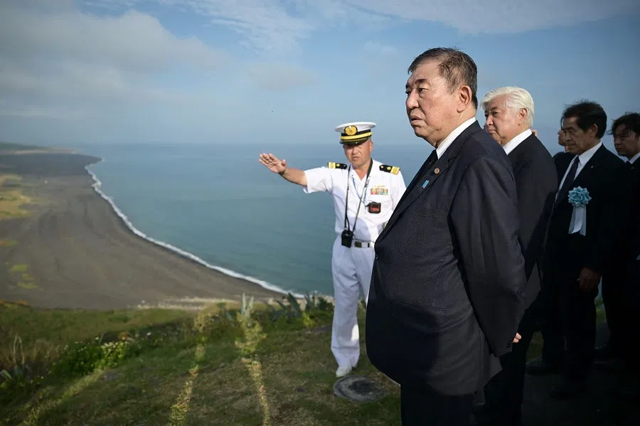 Japan’s Prime Minister Shigeru Ishiba visits Mount Suribachi in the village of Ogasawara on Iwo Jima island following a joint US-Japan memorial service to mark the 80th anniversary of the Battle of Iwo Jima near the end of World War II, on 29 March 2025. (Japan Pool/AFP)