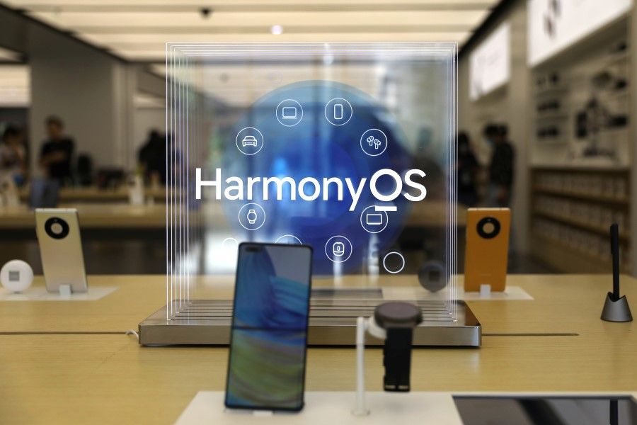 A Huawei Mate 40 smartphone installed with Huawei's operating system Harmony OS is displayed at a Huawei store in Beijing, China 3 June 2021. (Tingshu Wang/Reuters)