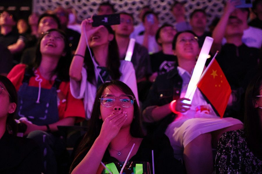 People watch the Arena of Valor Asian Games Version Final at the Hangzhou Esports Center, Hangzhou, Zhejiang province, China, on 26 September 2023. (Ann Wang/Reuters)