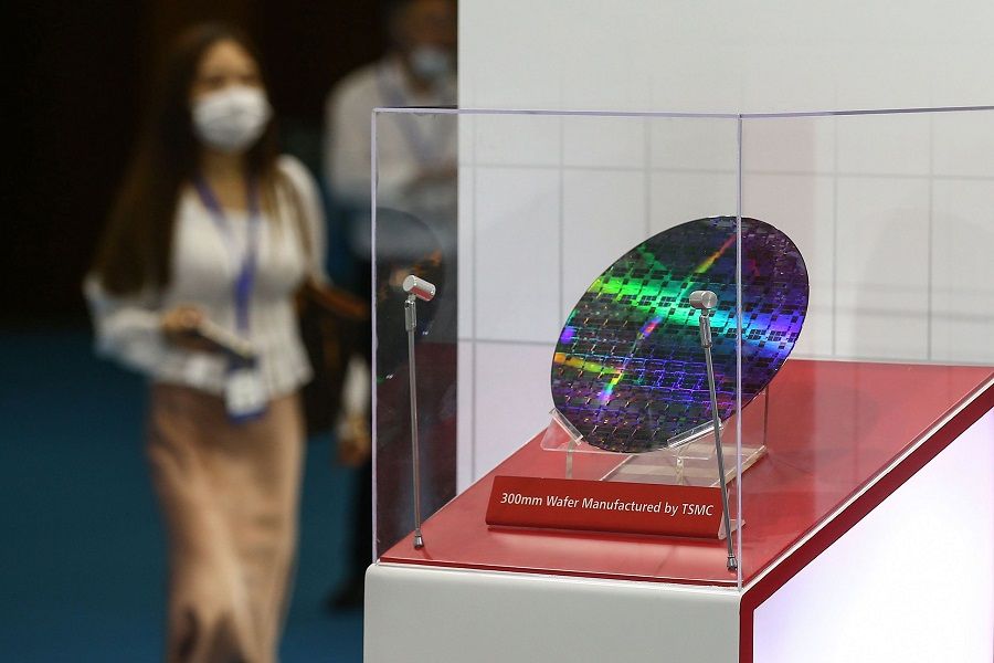 A chip by Taiwan Semiconductor Manufacturing Company (TSMC) is seen at the 2020 World Semiconductor Conference in Nanjing, Jiangsu province, China, on 26 August 2020. (STR/AFP)