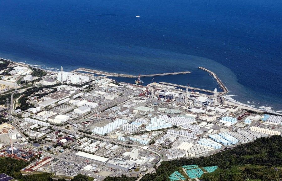 An aerial view shows the Fukushima Daiichi nuclear power plant, which started releasing treated radioactive water into the Pacific Ocean, in Okuma town, Fukushima prefecture, Japan, 24 August 2023, in this photo taken by Kyodo. (Kyodo/via Reuters)