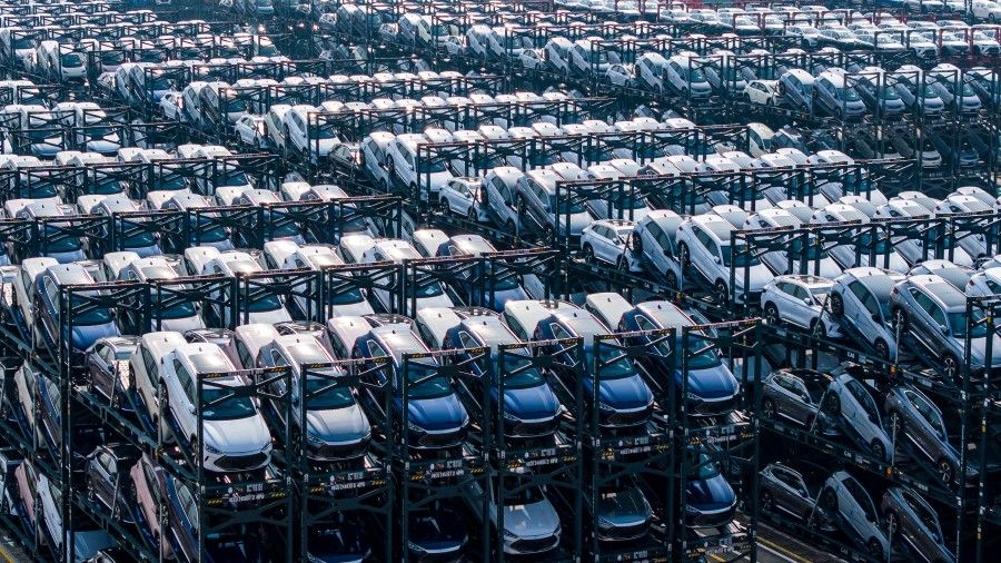 BYD electric cars waiting to be loaded onto a ship are seen stacked at the international container terminal of Taicang Port in Suzhou, in China's eastern Jiangsu province on 8 February 2024. (AFP)
