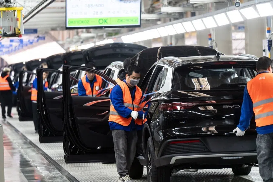 Workers on the assembly line for electric vehicles at the BYD Co. factory in Zhengzhou, Henan province, China, on 5 November 2025. (Qilai Shen/Bloomberg)