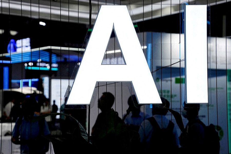 An AI (Artificial Intelligence) sign is seen at the World Artificial Intelligence Conference (WAIC) in Shanghai, China, 6 July 2023. (Aly Song/Reuters)