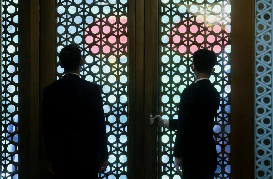 Staff wait for the arrival of US Secretary of State Antony Blinken ahead of his meeting with China's Foreign Minister Qin Gang at the Diaoyutai State Guesthouse in Beijing on 18 June 2023. (Leah MillisAFP)