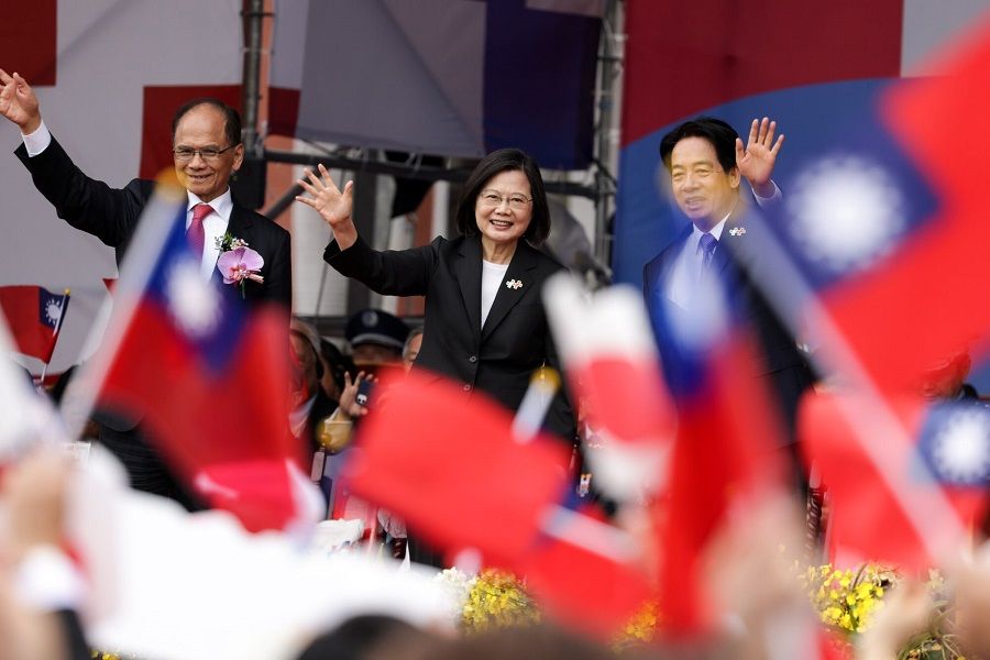 Taiwan's President Tsai Ing-wen (centre) and Vice-President William Lai (right) wave on the stage during the Double Ten Day celebration in Taipei, Taiwan, on 10 October 2023. (I-Hwa Cheng/Bloomberg)