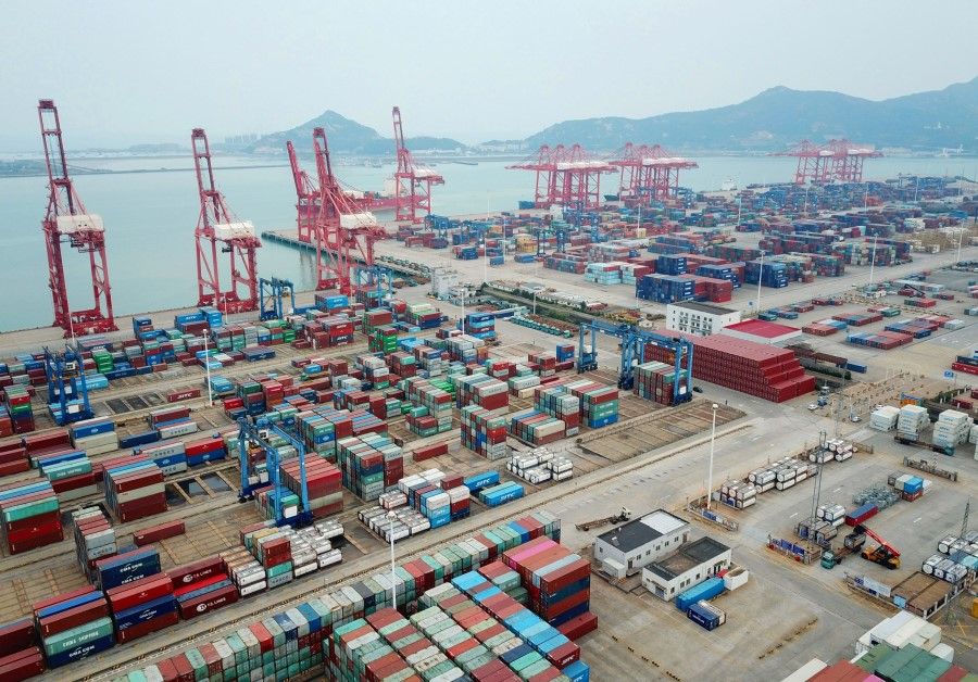 An aerial view shows the container port in Lianyungang, in eastern China's Jiangsu province, 13 October 2020. (STR/AFP)