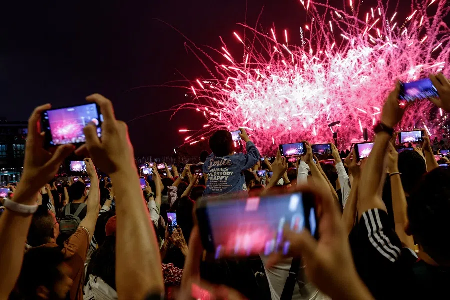 Fireworks light up over Victoria Harbour for the five-day Chinese May Day holiday, in Hong Kong, China, 1 May 2024. (Tyrone Siu/Reuters)