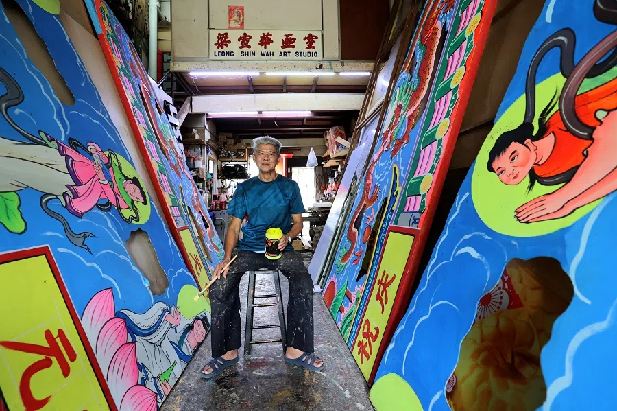Painter Leong Fong Wah, 70, is perhaps the only remaining craftsman still hand-painting decorative archways and stage backdrops in Singapore.