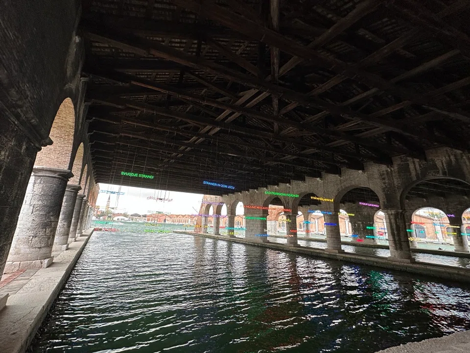 Venice Biennale Arsenale neon installation Foreigners Everywhere by Claire Fontaine. (SPH Media)