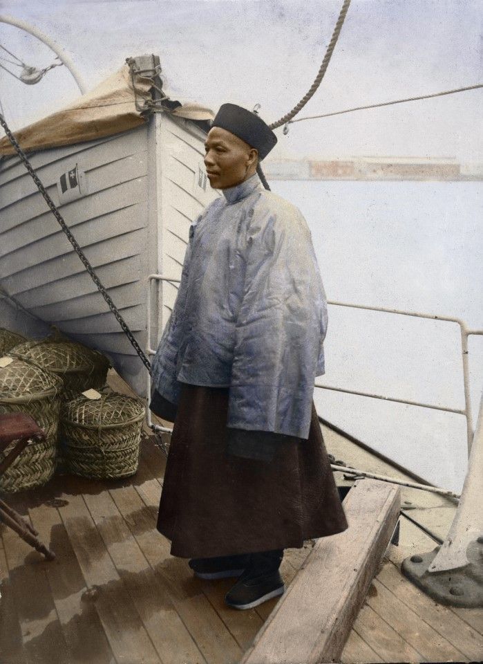 A Chinese "agent" on board a coolie boat. His job was to recruit villagers back home to cross the sea to work. He also managed them and even travelled with them to make sure everything went smoothly. The Western bosses who brought in the coolies also needed the Chinese agents to pass on instructions. Written records say little about the agents; they are generally thought to be akin to foremen. But this photograph shows that some agents were quite well to do, almost like Chinese merchants. Some successful agents even rose to become international traders.
