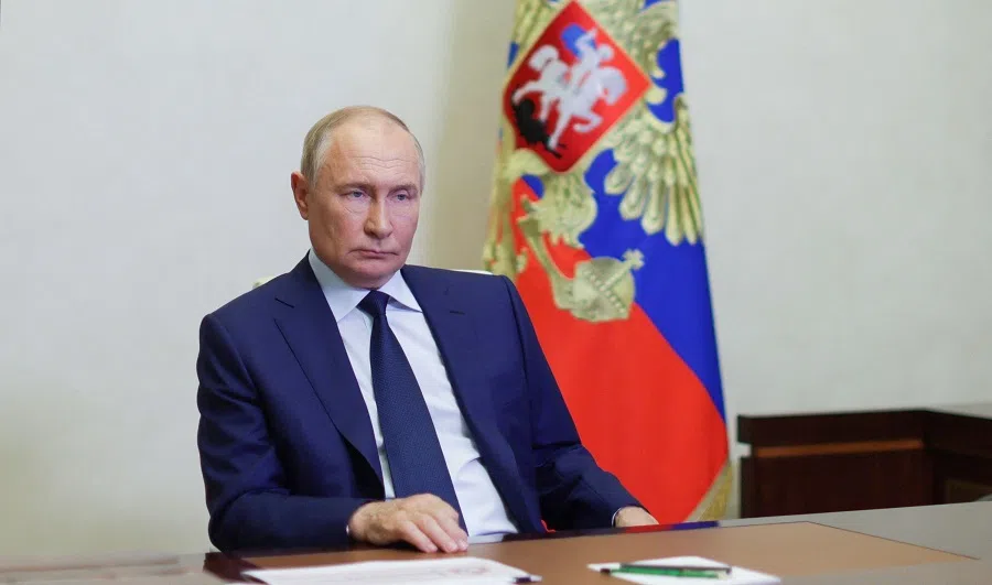 In this pool photograph distributed by Russian state owned Sputnik agency, Russian President Vladimir Putin attends a remote meeting with Kursk Region Governor via video call in Moscow, on 8 August 2024. (Gavriil Grigorov/Pool/AFP)