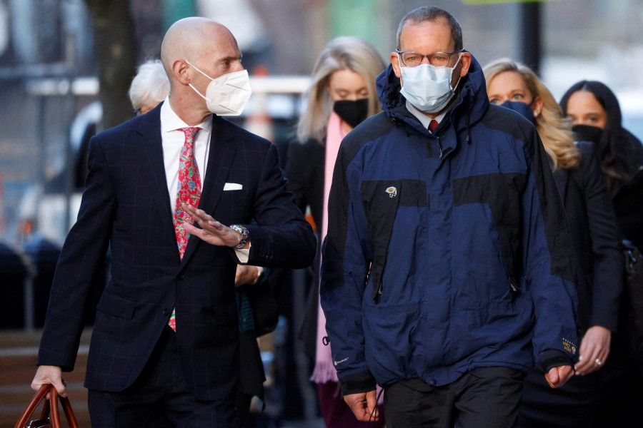Harvard University nanotechnology professor Charles Lieber, who is charged with lying to US authorities about his ties to a China-run recruitment programme and funding he allegedly received from the Chinese government for research, arrives at the federal courthouse in Boston, Massachusetts, US, 14 December 2021. (Brian Snyder/Reuters)