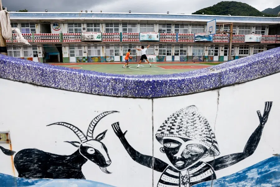 Children play basketball at a school on Orchid Island, Taiwan, on 14 June 2026.