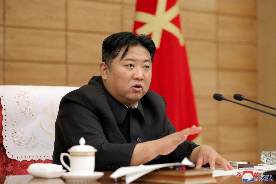 North Korean leader Kim Jong-un speaks at a politburo meeting in this undated photo released by North Korea's Korean Central News Agency (KCNA) on 21 May 2022. (KCNA via Reuters)