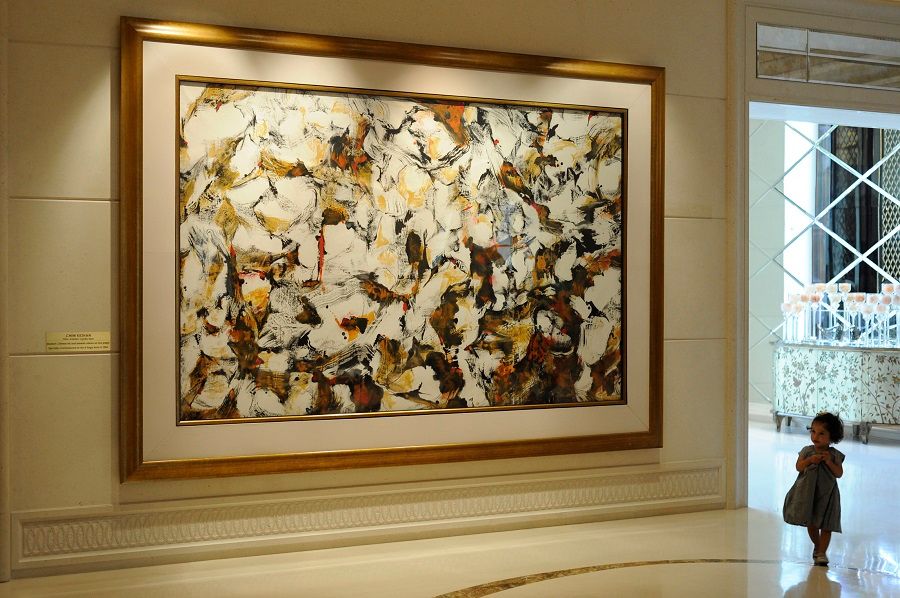 Henri Chen Kezhan's Golden Landscape, an abstract Chinese painting, hanging in the lobby of St. Regis Hotel, Singapore. (SPH)