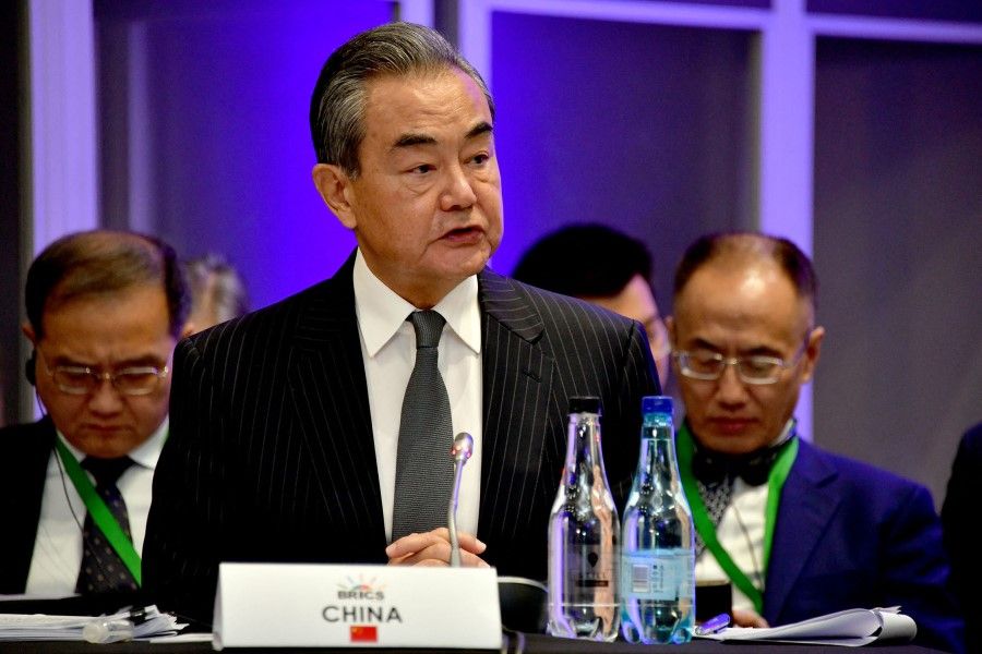 Director of the Office of the Foreign Affairs Commission of the Communist Party of China's Central Committee Wang Yi (left) attends a Friends of BRICS (a grouping of the world economies of Brazil, Russia, India, China and South Africa) meeting in Johannesburg on 24 July 2023. (Elmond Jiyane/GCIS/AFP)