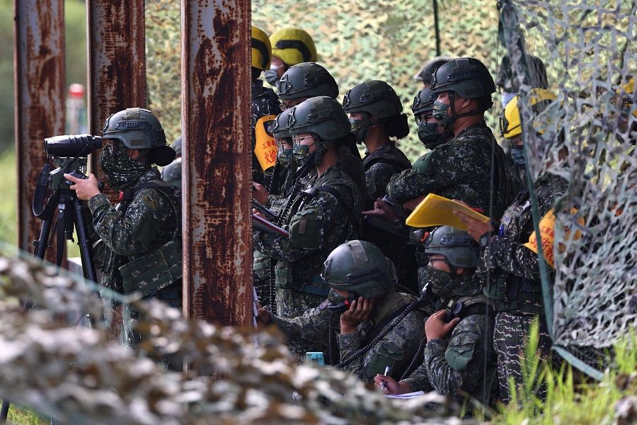 Soldiers check locations of target during a live-fire military exercise in Pingtung, Taiwan, 7 September 2022. (Ann Wang/Reuters)