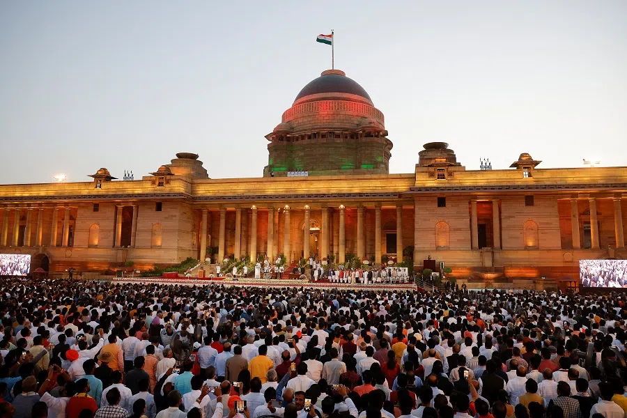 People attend Indian Prime Minister Narendra Modi’s swearing-in ceremony at the presidential palace in New Delhi, India, on 9 June 2024. (Adnan Abidi/Reuters)