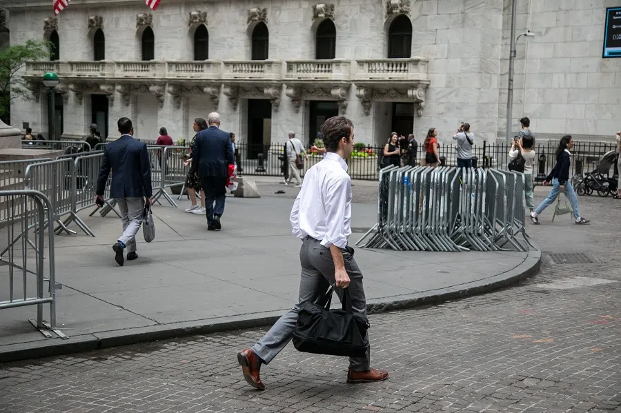 Pedestrians in front of the New York Stock Exchange (NYSE) in New York, US on 7 June 2024.  (Michael Nagle/Bloomberg)