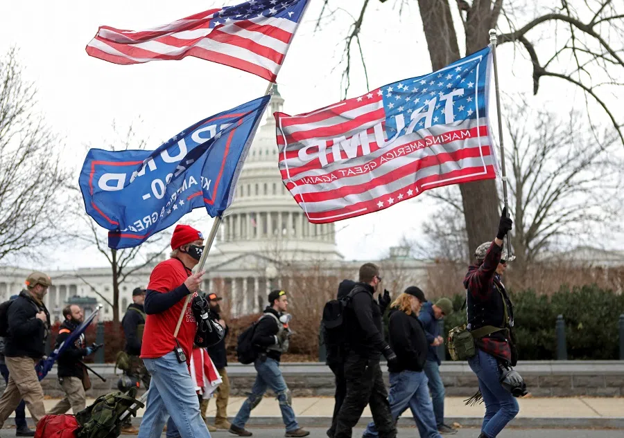 Supporters of US President Donald Trump protest against the certification of the 2020 presidential election results by the Congress, in Washington, US, 6 January 2021. (Jim Urquhart/Reuters)