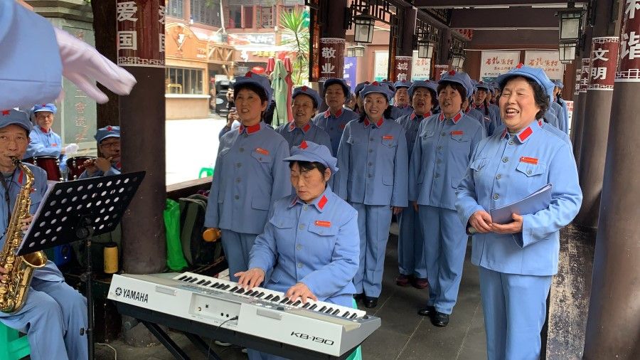 Members of the Zunyi Red Singing Group belting out red revolutionary songs in Zunyi, Guizhou province, where Chinese leader Mao Zedong assumed top leadership of the CCP in 1935. (SPH)