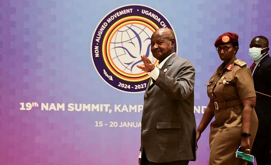 Uganda’s President Yoweri Museveni walks to meet leaders from member countries of the Non-Aligned Movement (NAM) during the 19th summit in Munyonyo suburb of Kampala, Uganda, on 20 January 2024. (Abubaker Lubowa/Reuters)