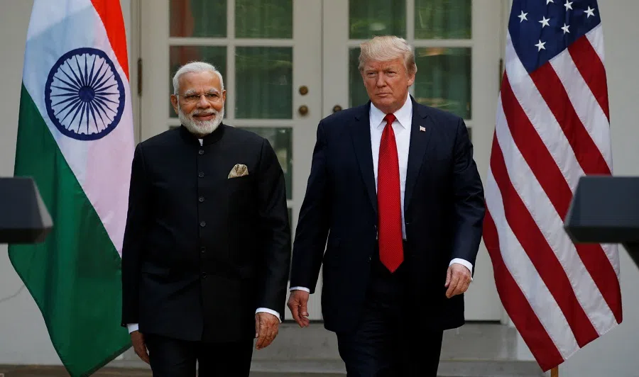 US President Donald Trump (R) arrives for a joint news conference with Indian Prime Minister Narendra Modi in the Rose Garden of the White House in Washington, US, on 26 June 2017.