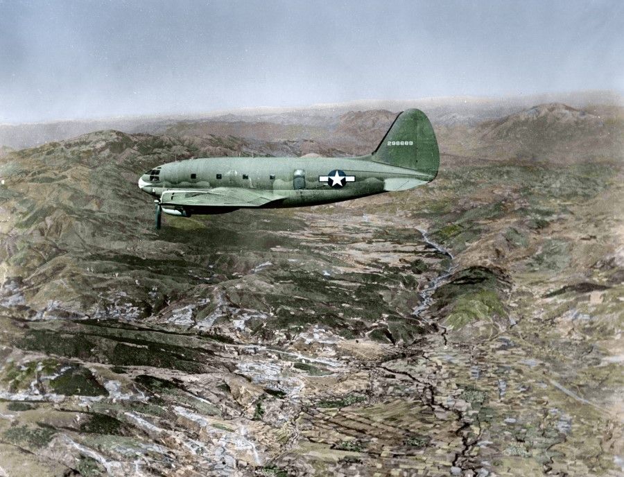 A US C-46 transport plane flies over the mountains of western China, January 1945. This model was in service from 1942 to 1945, and was one of the main aircraft flying the "Hump" route - the name given by Allied pilots in WWII to the eastern end of the Himalayan mountains. With Southeast Asia occupied by Japanese troops, the Hump route connecting Chongqing and India became China's most important supply line.